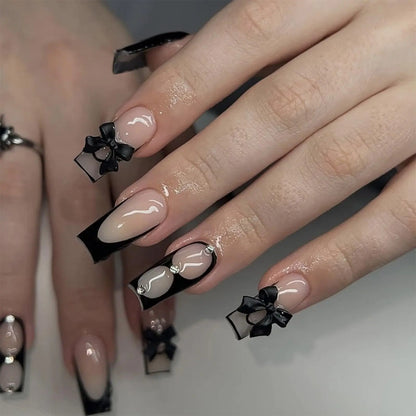 IMSOHOT Black Press on Nails Medium Square Fake Nails French Tips Glossy Glue on Nails Full Cover Artificial False Nails with Cute Bow Designs Nude Squoval Stick on Acrylic Nails for Women 24Pcs